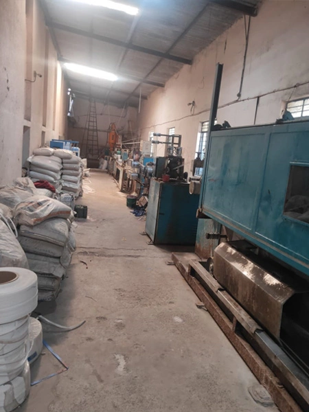 Factory interior showing PP strapping process