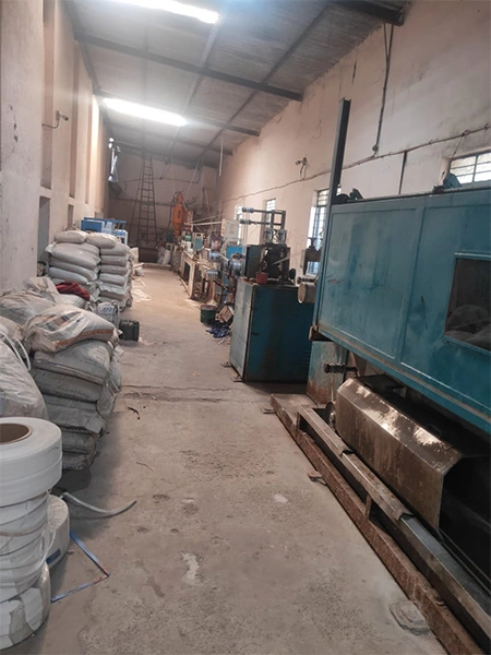 Close-up of strapping machine in action