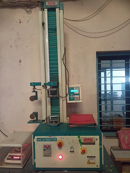 Machine operator adjusting strapping tension